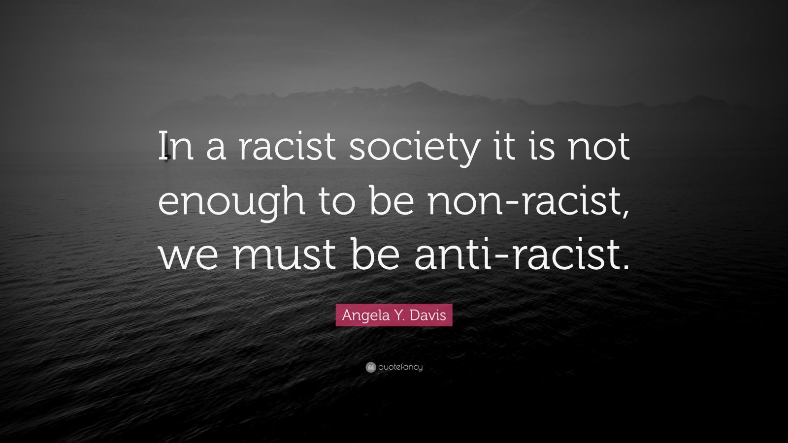 Angela Y. Davis Quote: “In a racist society it is not enough to be non ...