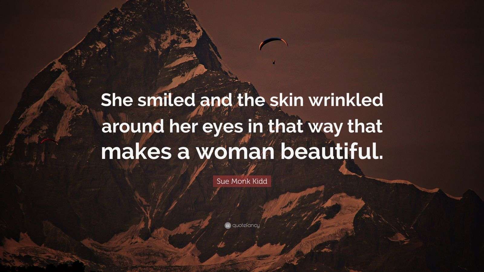 Sue Monk Kidd Quote “She smiled and the skin wrinkled around her eyes