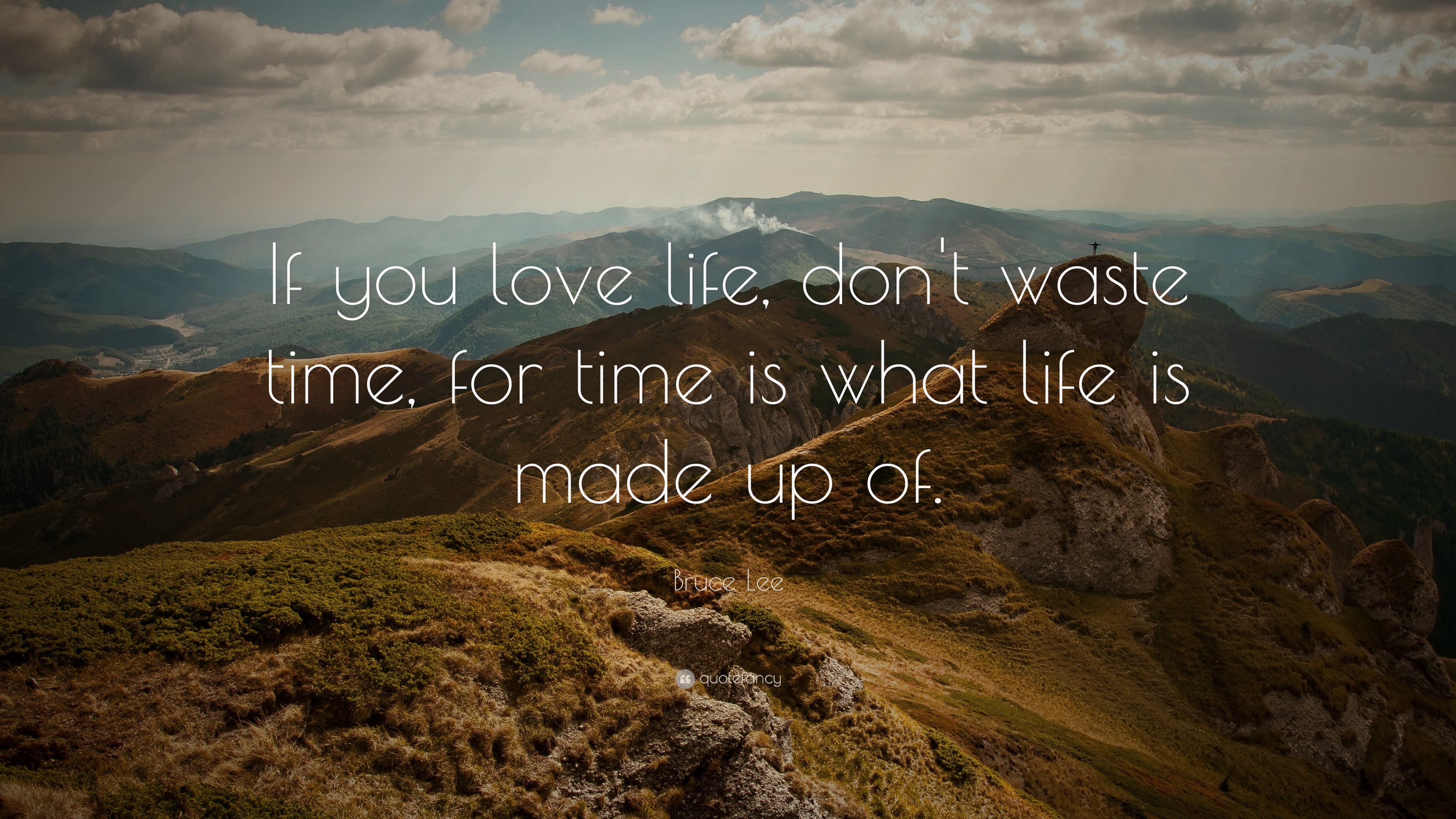 Bruce Lee Quote: “If you love life, don’t waste time, for time is what