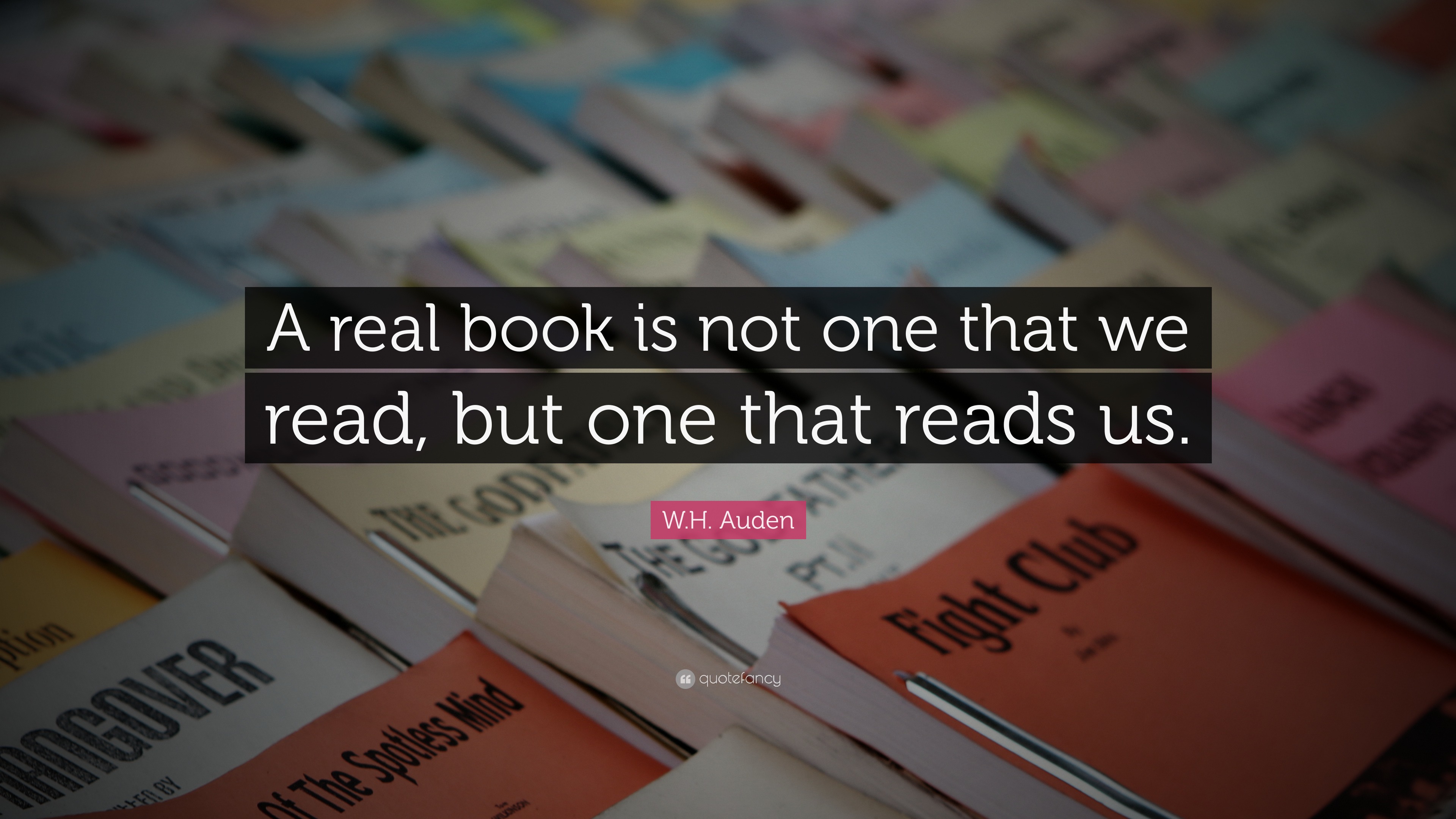 W.H. Auden Quote: “A real book is not one that we read, but one that ...