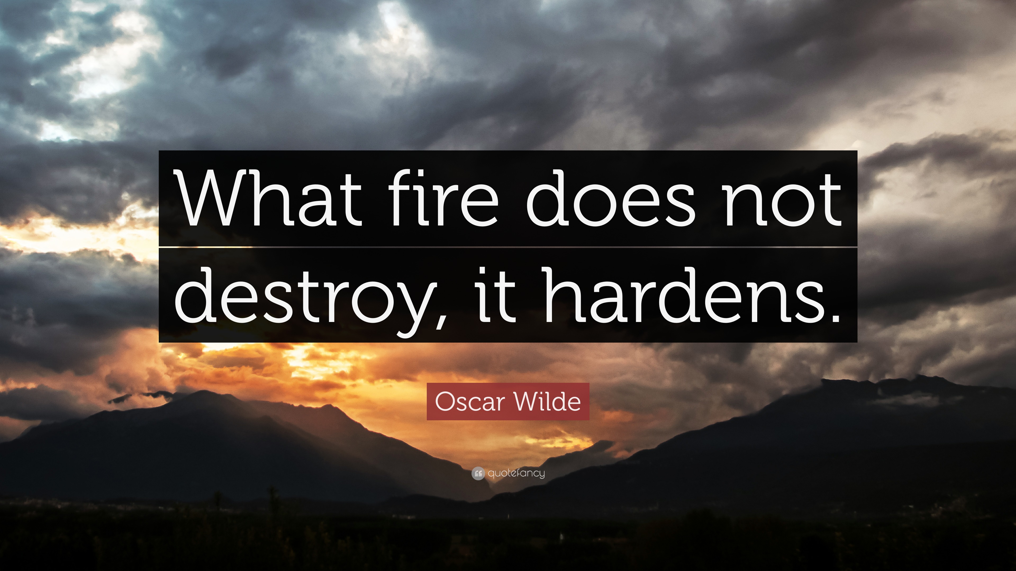 Oscar Wilde Quote “What fire does not destroy, it hardens.”
