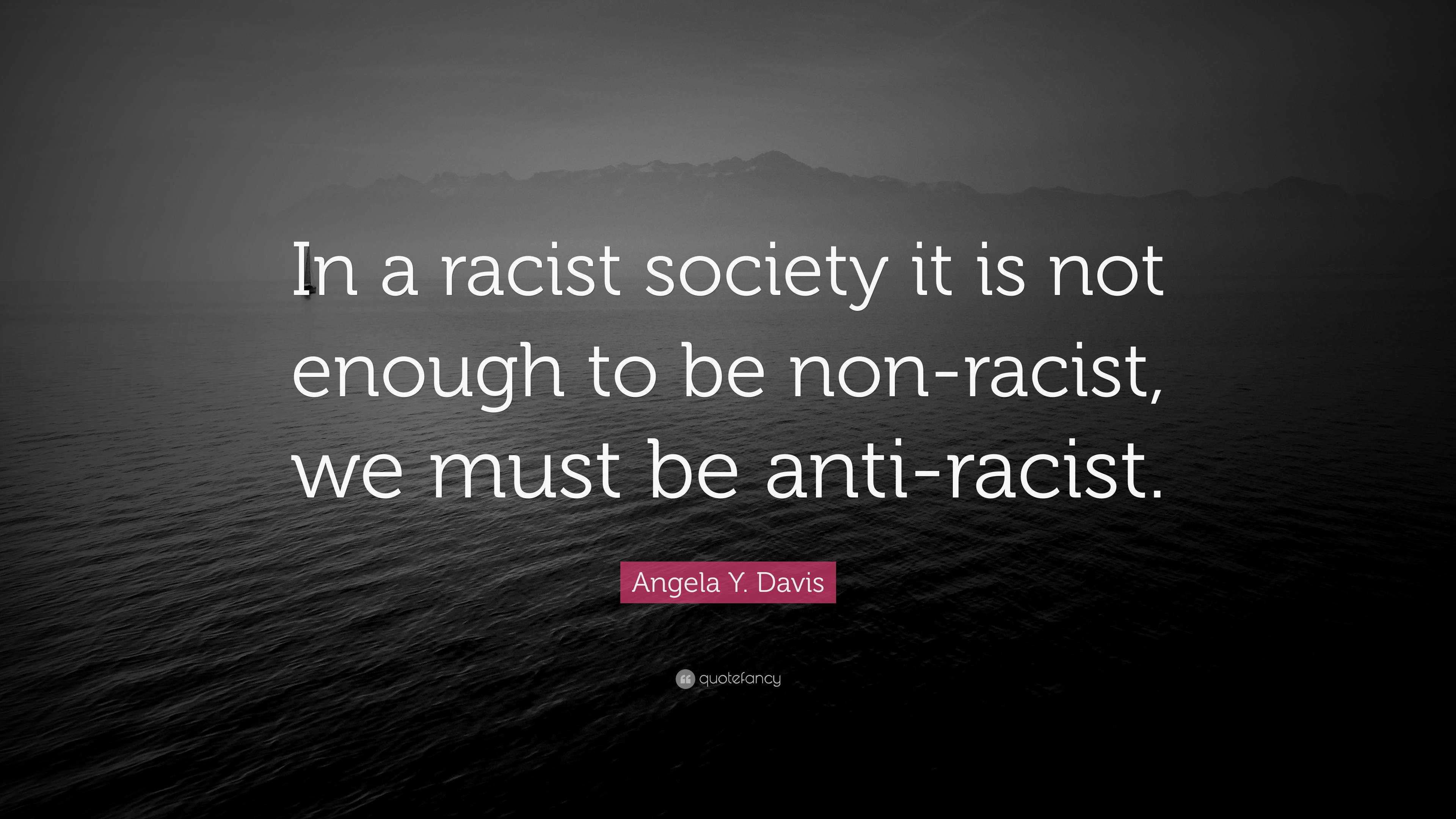 Angela Y. Davis Quote: “In a racist society it is not enough to be non ...