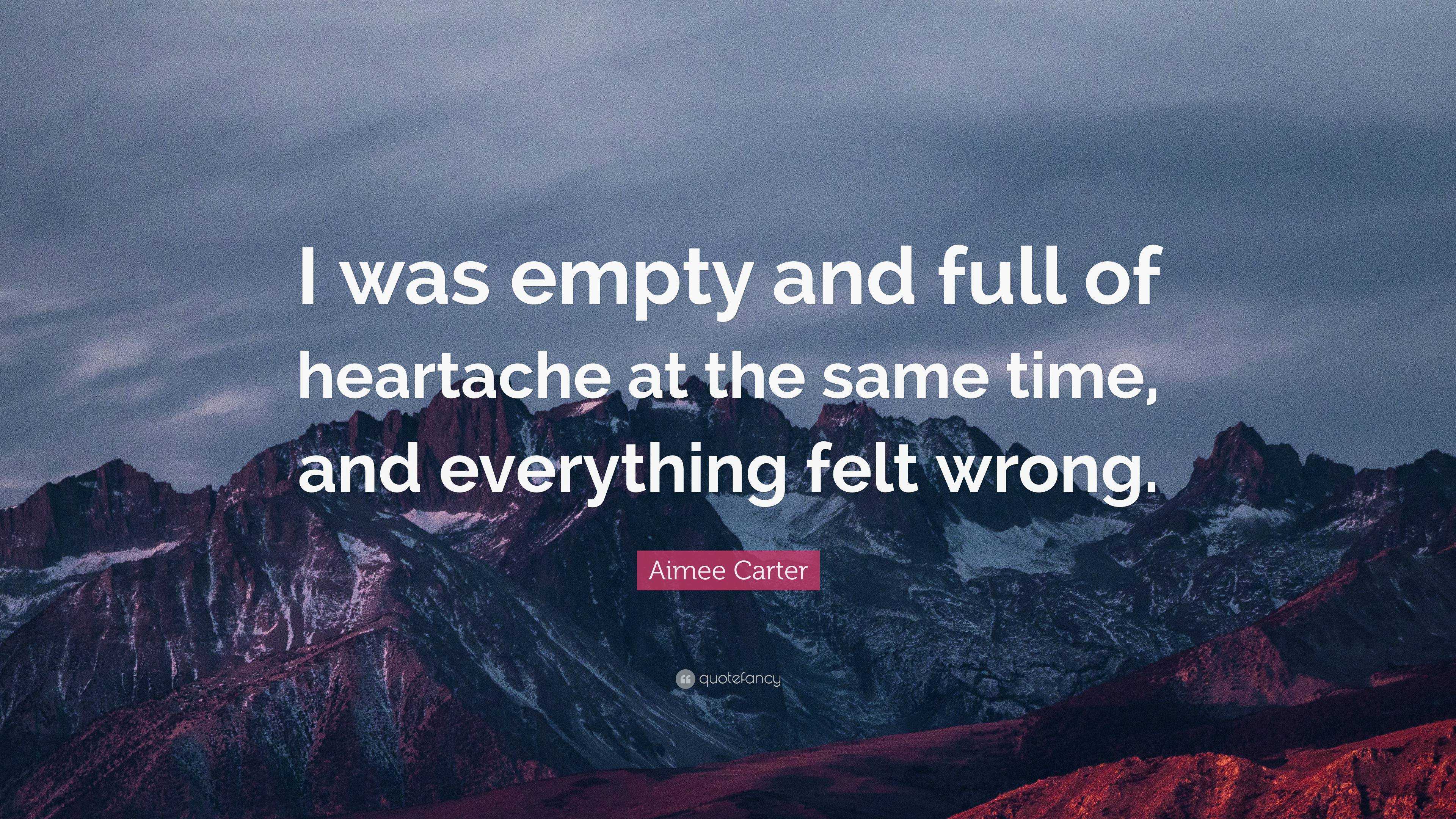 Aimee Carter Quote: “I was empty and full of heartache at the same time ...