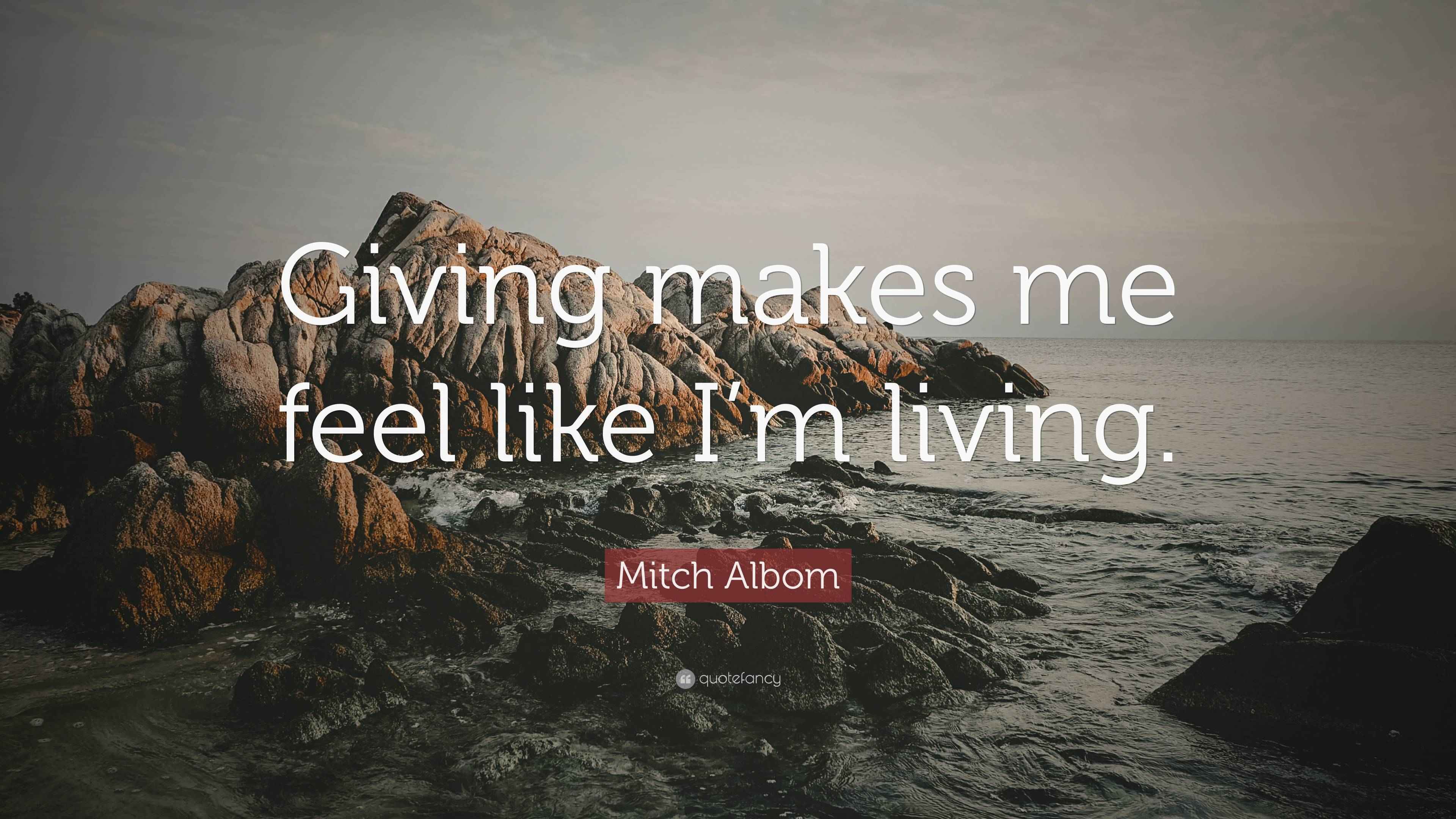 Mitch Albom Quote: “Giving makes me feel like I’m living.”