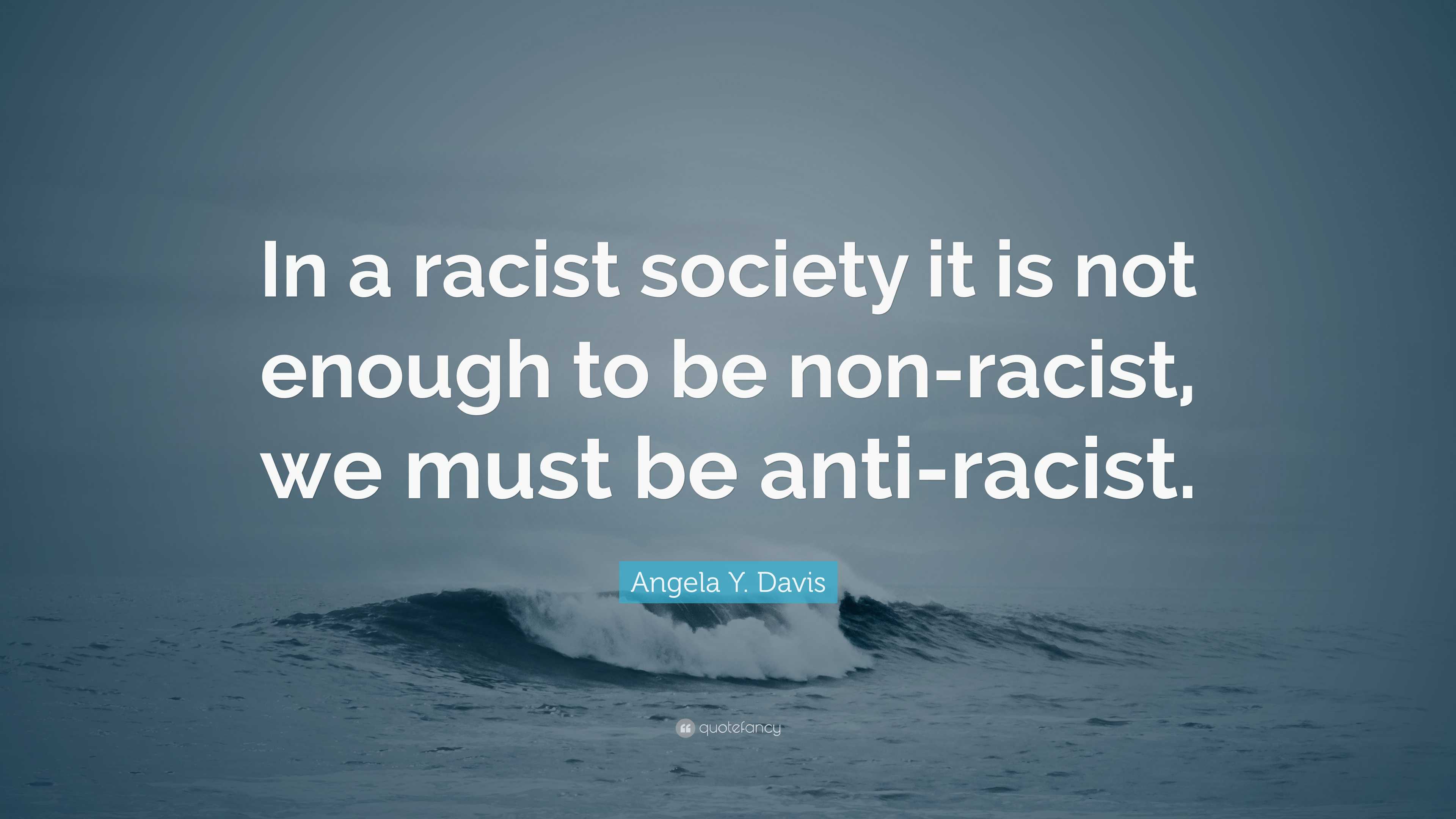 Angela Y. Davis Quote: “In a racist society it is not enough to be non ...