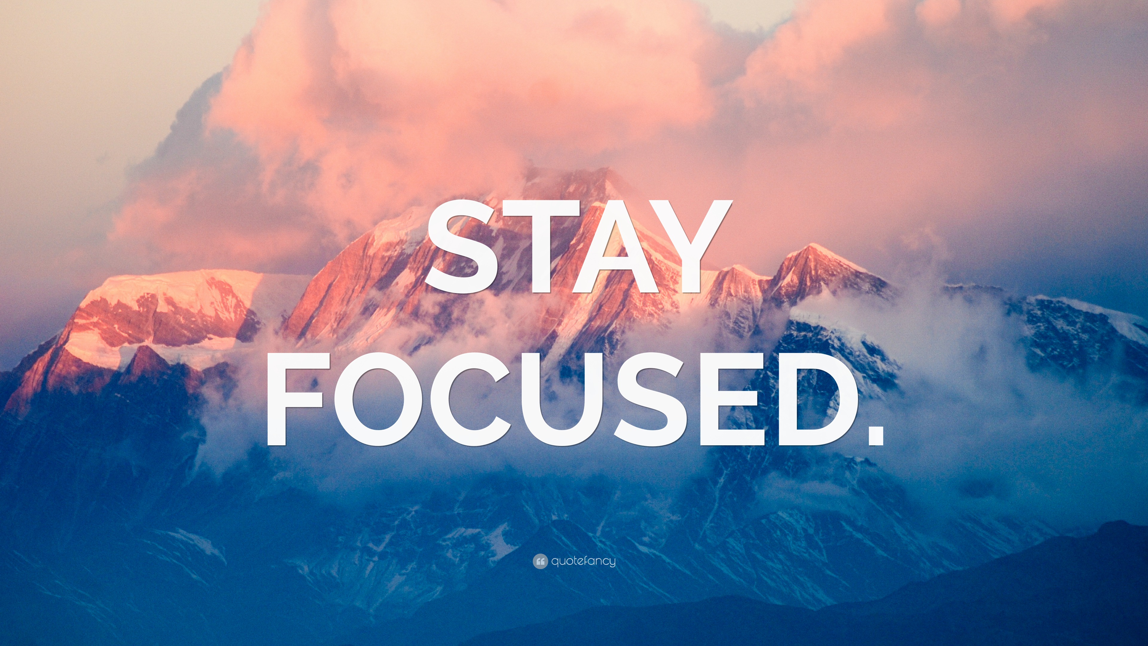 “STAY FOCUSED.” Wallpaper by QuoteFancy