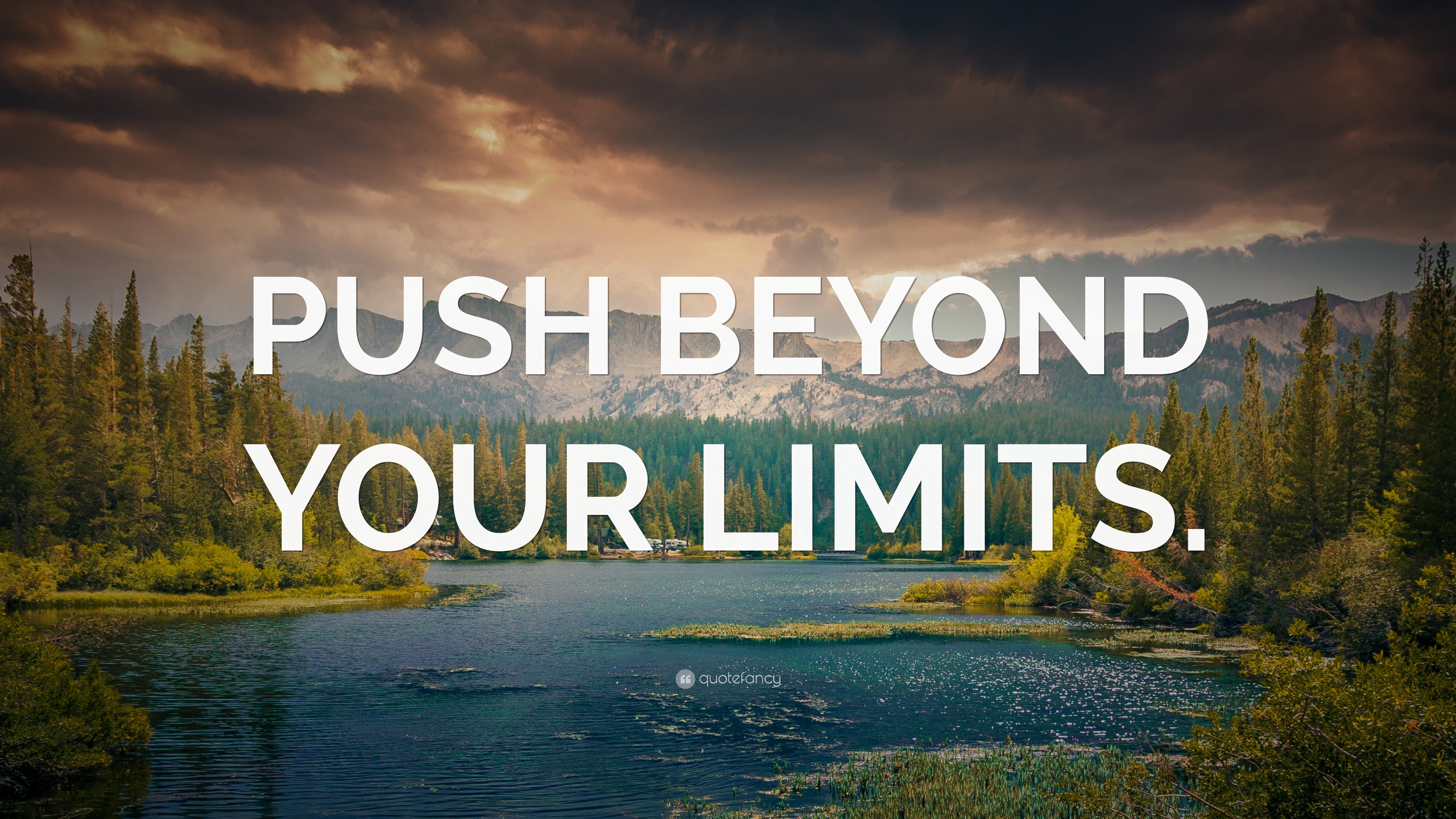 “PUSH BEYOND YOUR LIMITS.” Wallpaper by QuoteFancy