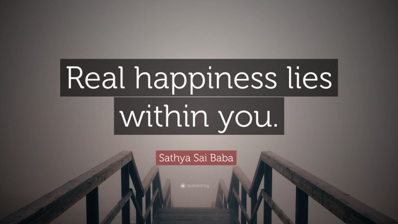 Sathya Sai Baba Quote: “Real happiness lies within you.”