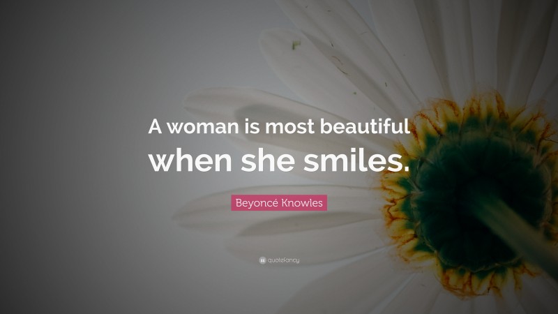 Beyoncé Knowles Quote: “A woman is most beautiful when she smiles.”